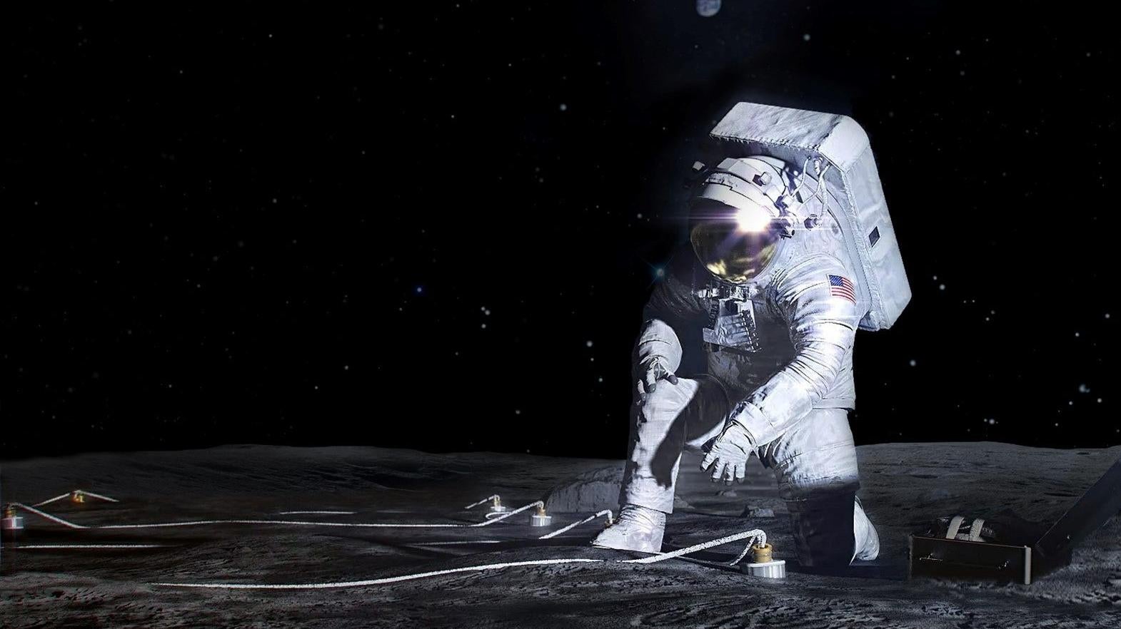 Concept d’artiste d’un astronaute Artémis déployant un instrument à la surface de la Lune.