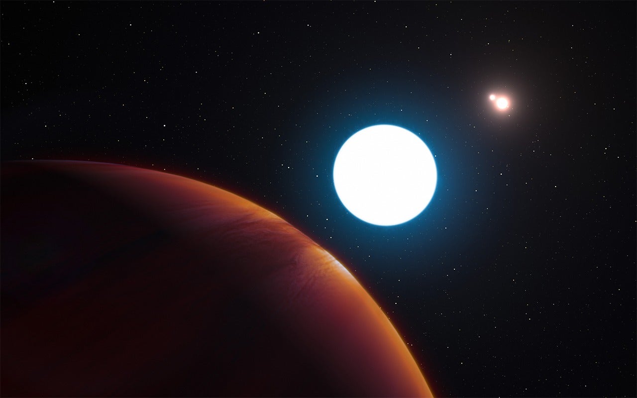 Vue d’artiste d’une planète appartenant à un système à trois étoiles. 