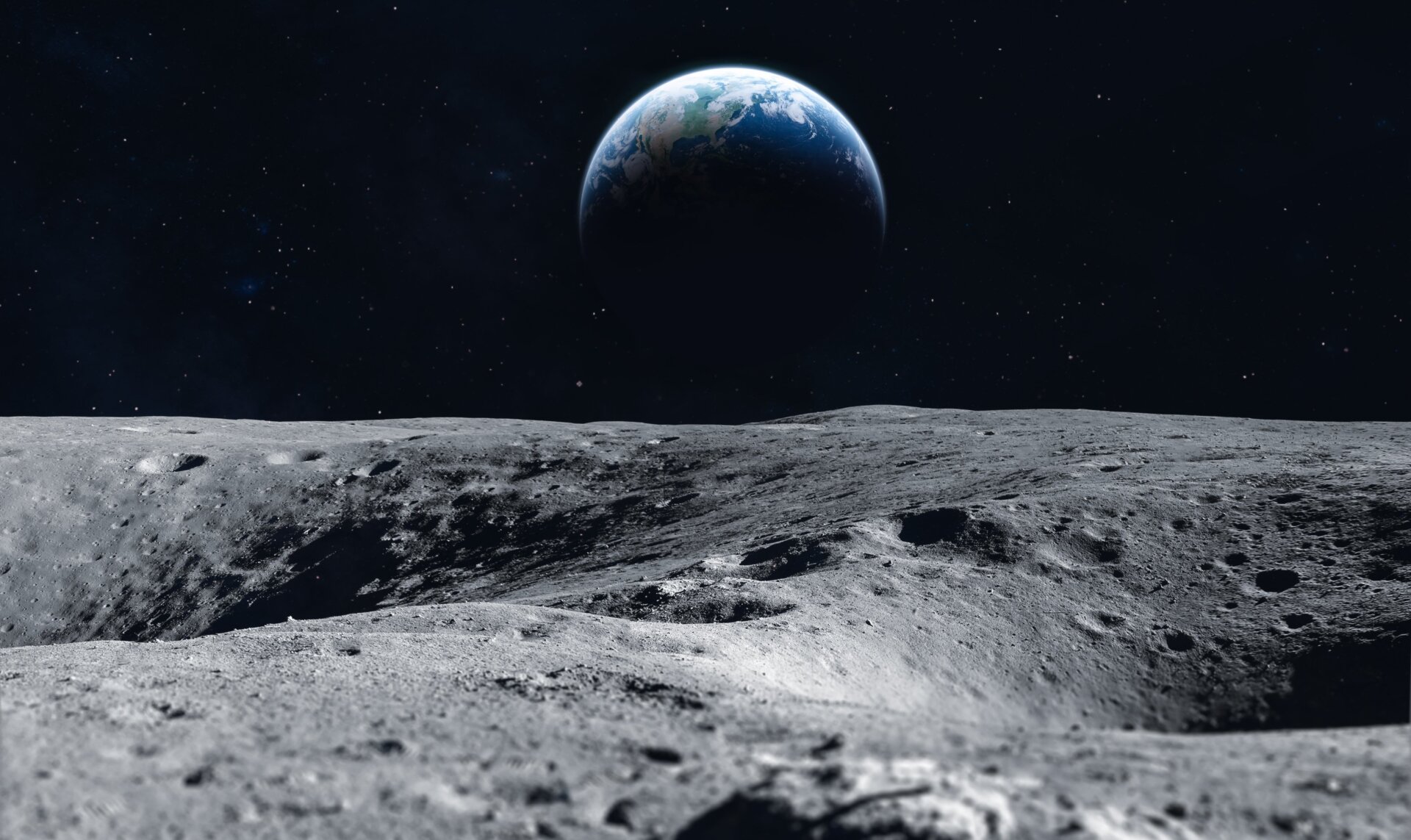 Représentation d’un artiste de la surface lunaire, avec la Terre au distance.