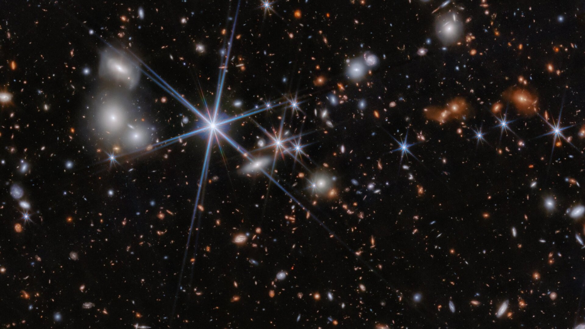 Une image de champ de l’espace qui contient le système galactique ZS7.